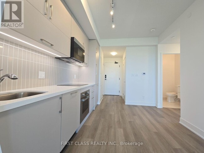 Building Photo - 56-1556 Andre de Grasse St