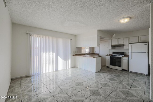 Building Photo - 3020 N 87th Ave