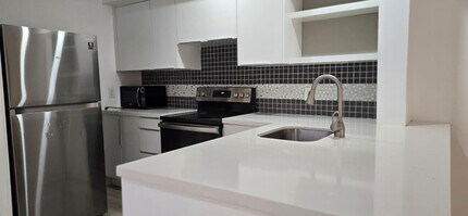 Building Photo - 10930 Royal Palm Blvd