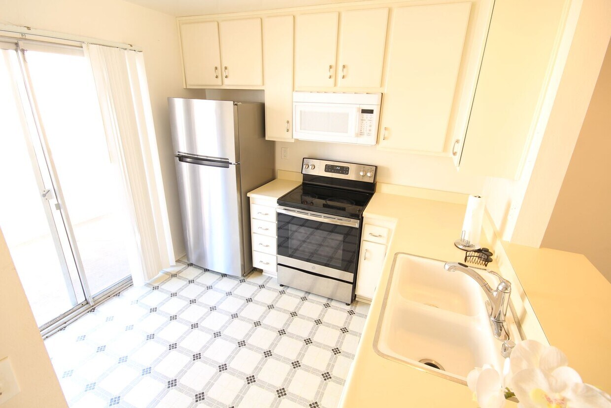 Primary Photo - 2-Bedroom 1.5-Bathroom Townhouse