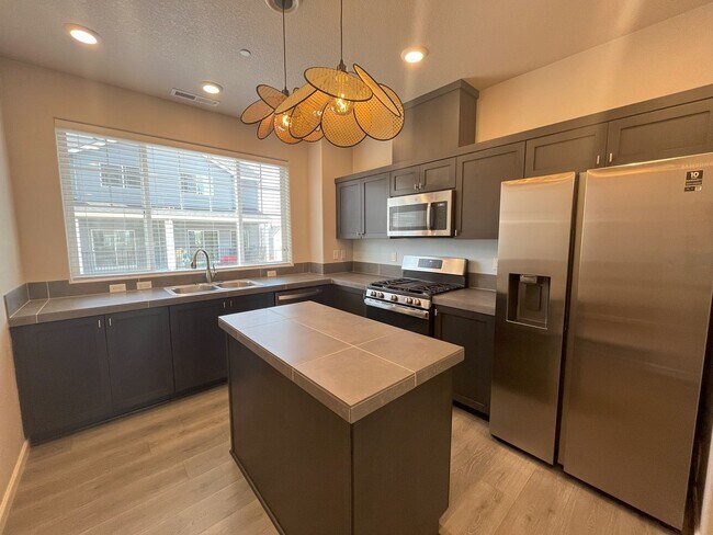 Building Photo - Your Modern Retreat with Open Living Space...