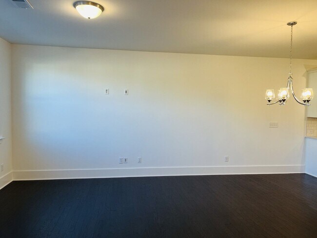 Building Photo - BRAND NEW Townhome located across from Wes...