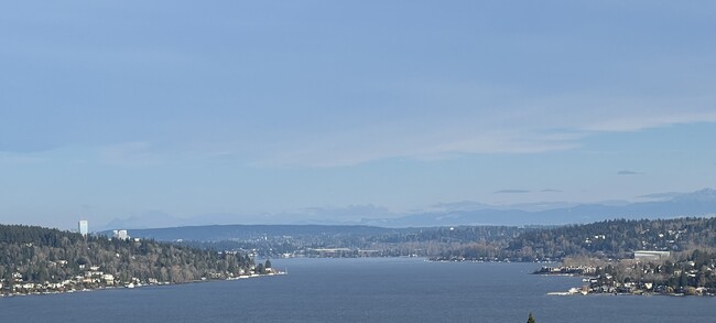 Another day of ever changing panorama of water, sky and mountains view with blue sky - 8306 S 124th St