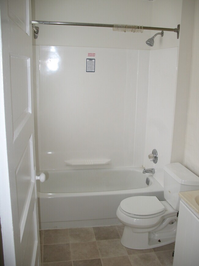 bath with tub and shower - 1058 1/2 W. 5th St.