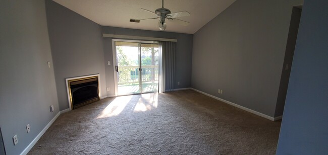 Living room w/gas fireplace - 100 Myrtle Greens Dr