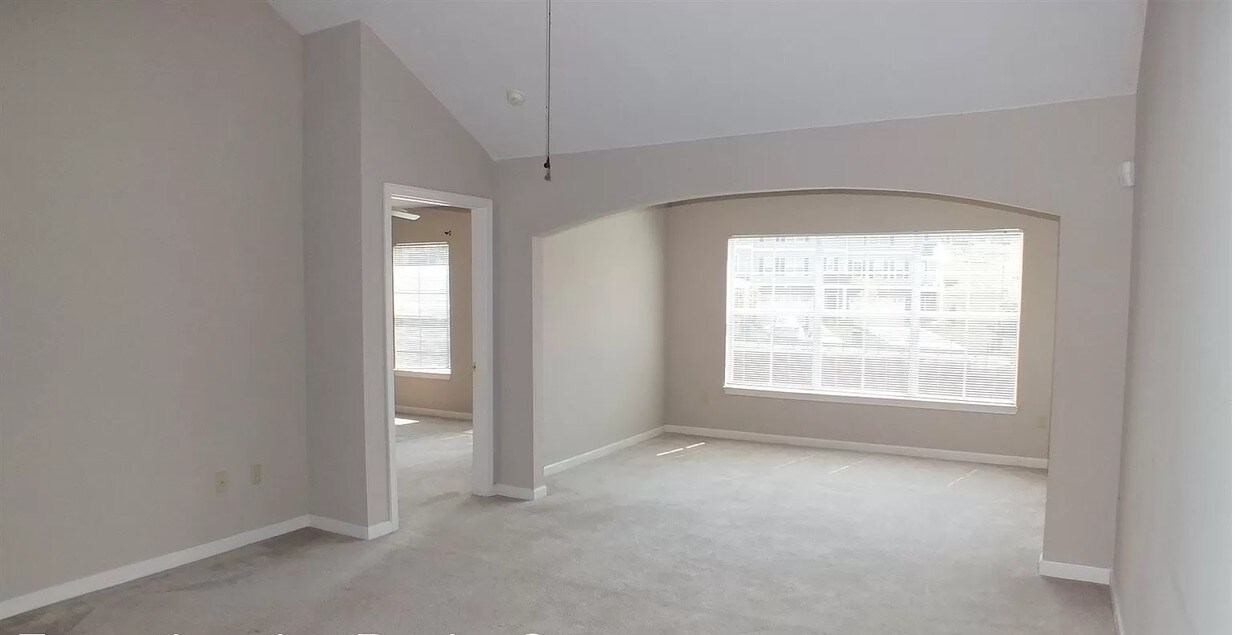 Living room and sunroom - 604 Bristol Village Dr