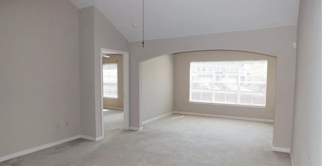 Living room and sunroom - 604 Bristol Village Dr