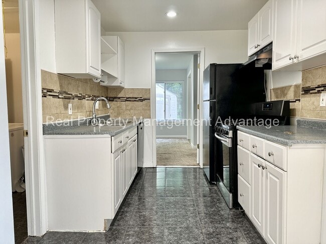 Building Photo - Mid-Century Ranch Boasts 3 Large Bedrooms ...