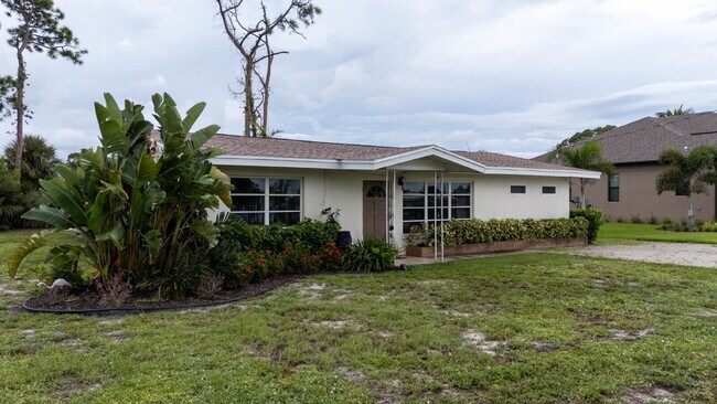 Building Photo - 3-bedroom home offers approximately 1,144 square feet of living space, an attached garage, an ove...