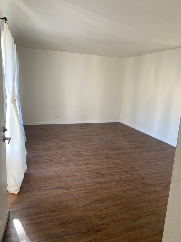 large open floorplan with beautiful hardwood style floors - 1244 Cabrillo Park Dr