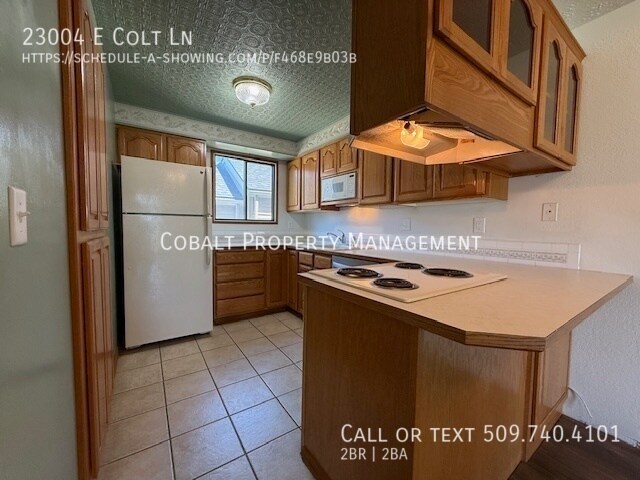 Foto del edificio - 23004 E Colt Ln
