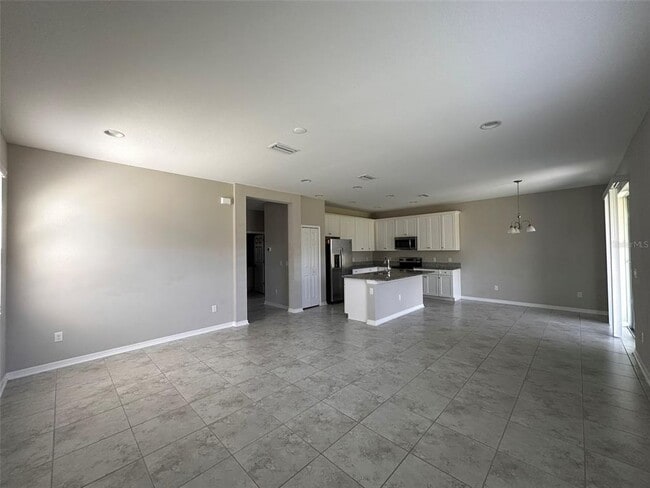 Building Photo - 7309 Pool Compass Loop