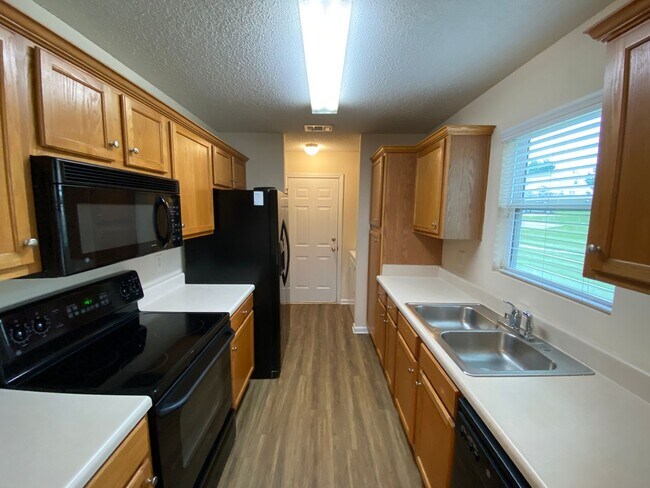 Building Photo - PRE-LEASING FOR AUGUST 2025!