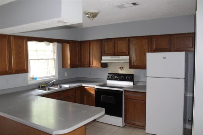 Photo - 5573 Tulip Tree Dr Townhome