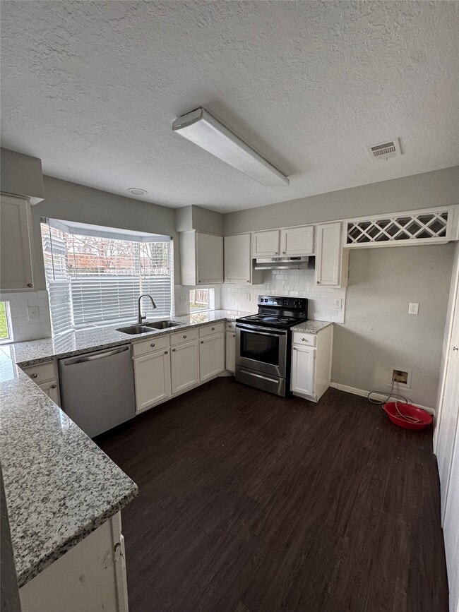 Building Photo - 7138 River Garden Dr