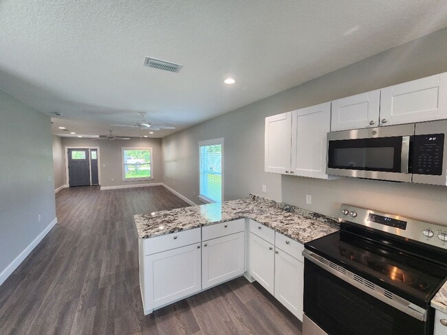 Building Photo - Brand New 2 Story Edgewater Duplex
