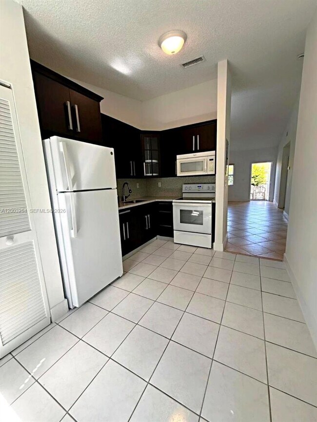 Building Photo - 15490 SW 134th Pl