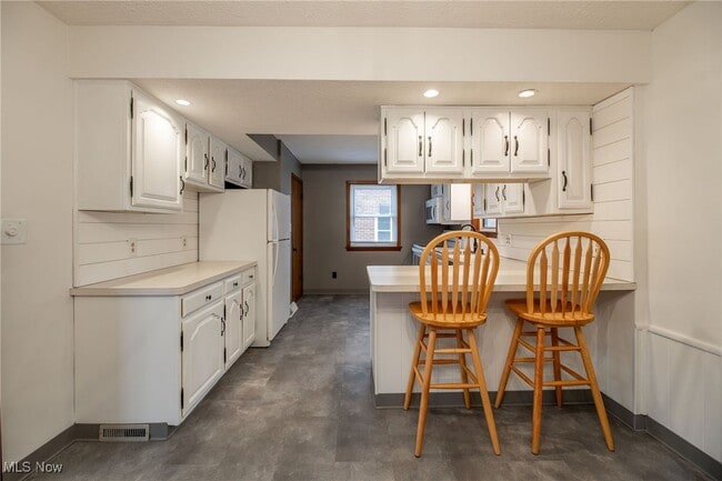 Foto del edificio - 6310 Hampstead Ave