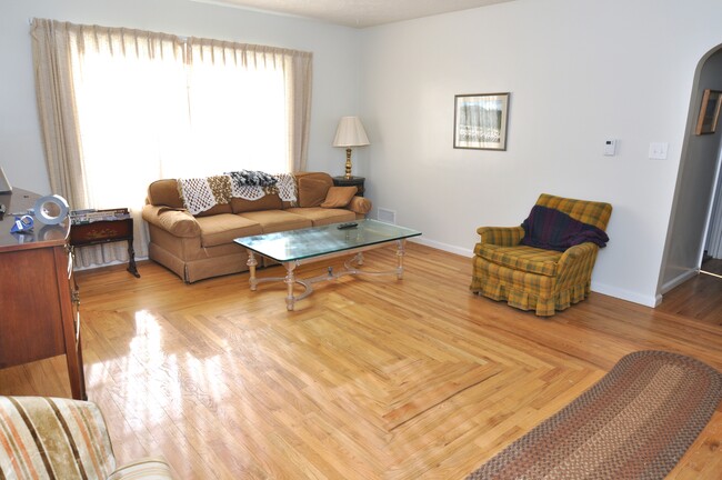 Main Living Room with original, beautiful hard wood floors! - 141 N 1st E