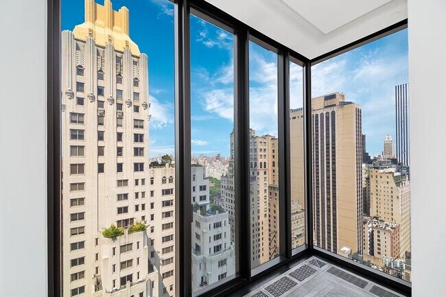 Foto del edificio - 111 W 57th St