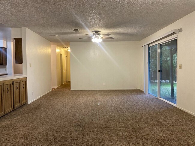 Building Photo - Available now! 3-bdrm./2-bath home with sp...