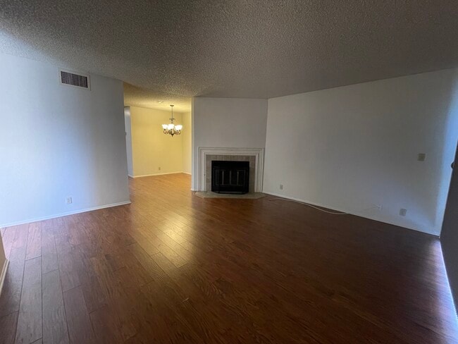Living room and fire place - 424 W Avenue J5