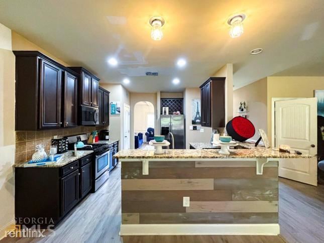 Building Photo - 4 br, 3 bath House - 5455 R Stirrup Way