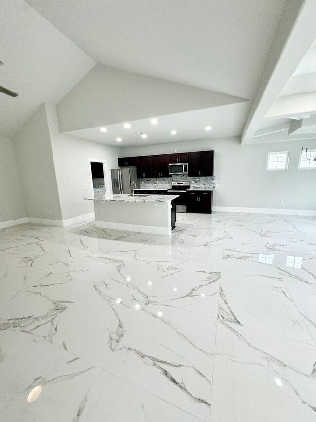 Foto del edificio - LOOK AT THIS ONE! BEAUTIFUL home with a pond view right outside the back patio!