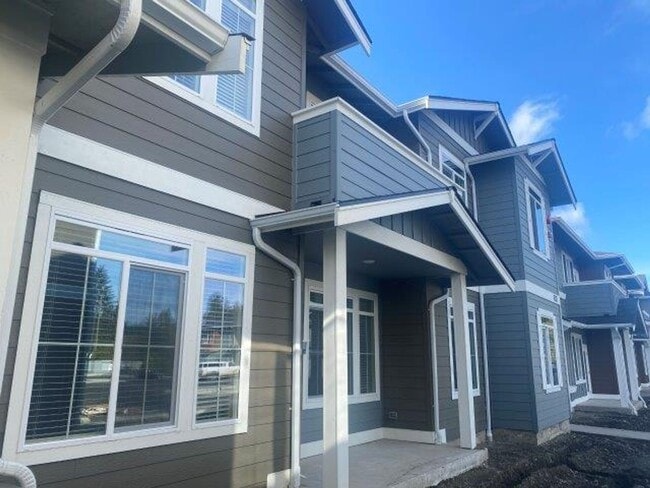 Building Photo - Spacious 2-Bedroom, 2-Bathroom Townhome in West Olympia — Schedule a tour today!