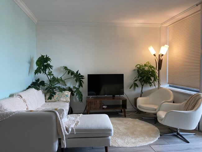 Living area! New Burrows sectional sofa. - 240 M St SW Apartment