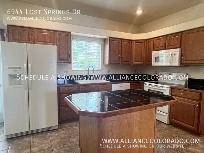 Foto del edificio - 6944 Lost Springs Dr