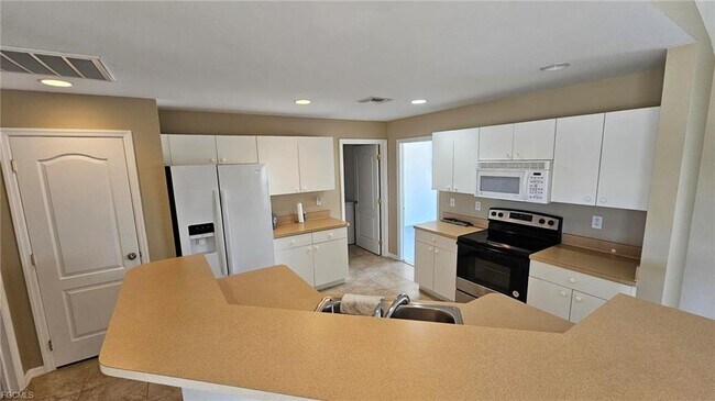 Photo - 1316 NE 16th Pl House