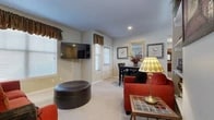 Located at 331 Crossroads Blvd in Bossier City, Louisiana, this single-story, 3-bedroom, 1-bathroom home offers a well-organized layout designed for comfortable everyday living. The open living area greets you with plush carpeting, recessed lighting, and a wall-mounted TV, complemented by built-in shelving ideal for display and storage. Natural light filters in through multiple windows dressed with classic valances and blinds, creating a warm and inviting atmosphere throughout. The dining area is tucked conveniently adjacent to the living space, featuring a window that brings in additional light. The kitchen is equipped with light wood cabinetry, tile flooring, black appliances including a range and over-the-range microwave, a full-size refrigerator, and an open pantry with built-in shelving for ample storage. The primary bedroom offers a comfortable retreat with ceiling fan, carpeted floors, and a walk-in closet. Additional bedrooms are similarly appointed. The shared bathroom features light wood vanity cabinetry, tile flooring, and a tub-shower combination. A dedicated laundry room with full-size washer and dryer hookups adds everyday convenience. This home provides a practical and cozy living environment in a well-established Bossier City location.