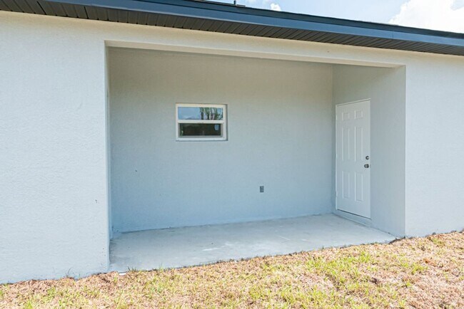 Foto del edificio - 3BR/2BA Home with 1-Car Garage in Prime SW Lehigh Acres – Brand New Construction