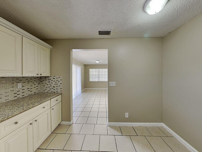 Building Photo - 9880 NW 5th Ct