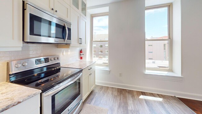 Building Photo - Modern Logan Circle One Bedroom W/Sleek Ki...