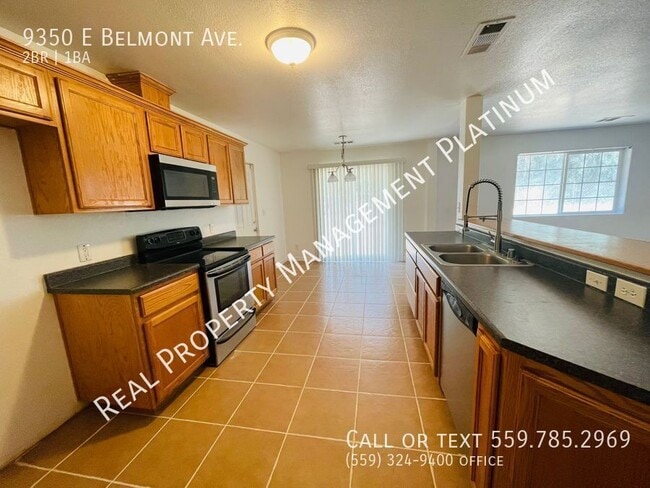Building Photo - 9350 E Belmont Ave