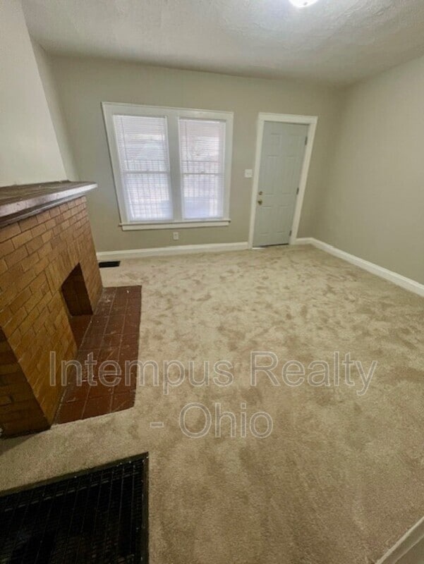 Building Photo - 1252 E 23rd Ave