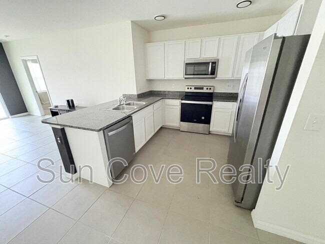 Foto del edificio - 3180 Suncoast Plains Dr