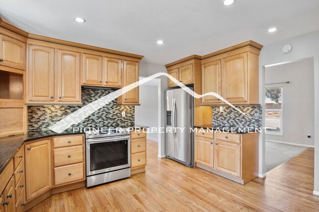 Building Photo - West Side 4 Bedroom Home with Mountain Setting Open Space Behind, 2 car Garage with AC
