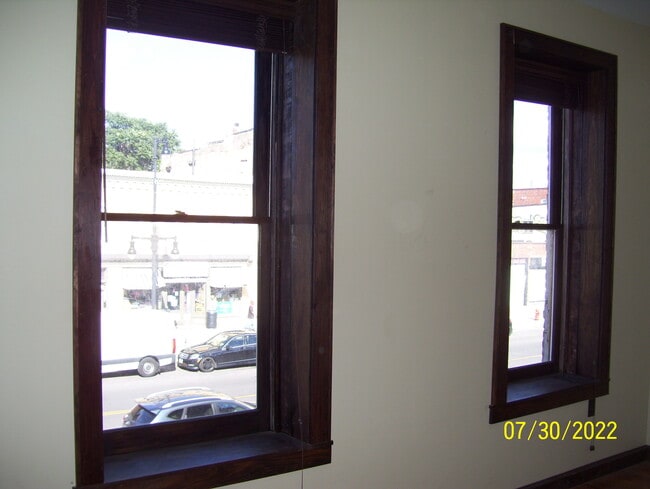 Large Front Windows - 751 N Salina St