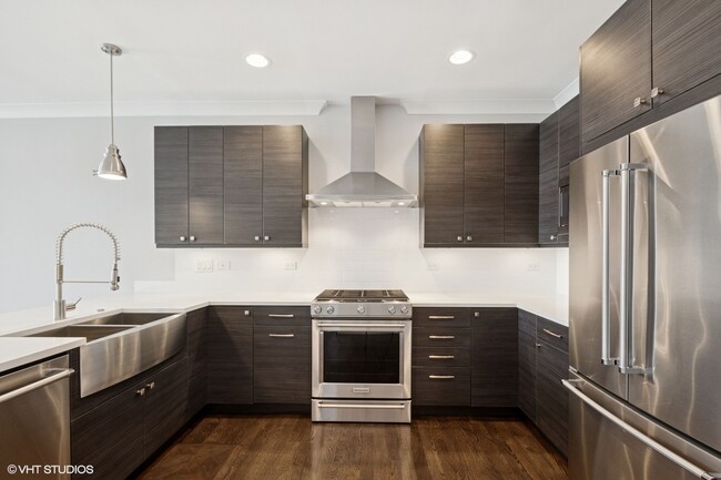 Spacious chefs kitchen with stainless steel appliances - 3047 N Oakley Ave