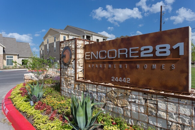 Encore 281 driveway - Encore 281 Apartments