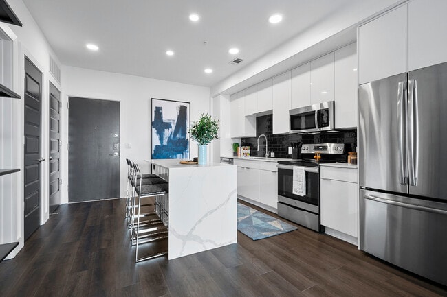 A1-Warhol I-Kitchen w/Waterfall Marble-top Island - Arya Peachtree
