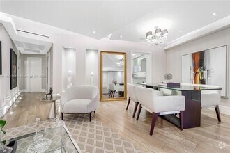 Building Photo - 10190 Collins Ave