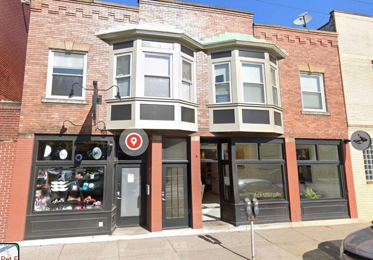 Front of property, access to unit through middle door, unit on the right - 4160 Lorain Ave