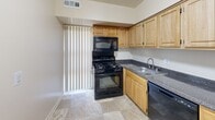 This 870 square foot apartment, located at 2207 Prior Rd, Apt D in Wilmington, DE, offers a practical and comfortable living space. The single-floor layout comprises three bedrooms, including a generous 230 square foot primary bedroom, providing ample space for rest and relaxation. The functional kitchen is equipped with light wood cabinetry, black appliances, and a convenient layout, ideal for meal preparation.

Throughout the apartment, neutral-toned walls and plush carpeting create a blank canvas for personalization. Large windows with vertical blinds allow natural light to flood the rooms, enhancing the sense of spaciousness. The living area is open and versatile, perfect for various furniture arrangements and lifestyle needs.

The bathroom, while not extensively detailed, appears to have basic amenities. Each bedroom offers closet space for storage, with the primary bedroom likely featuring more extensive storage options. The overall design prioritizes functionality and comfort, making this apartment an ideal choice for those seeking a practical living space in Wilmington.