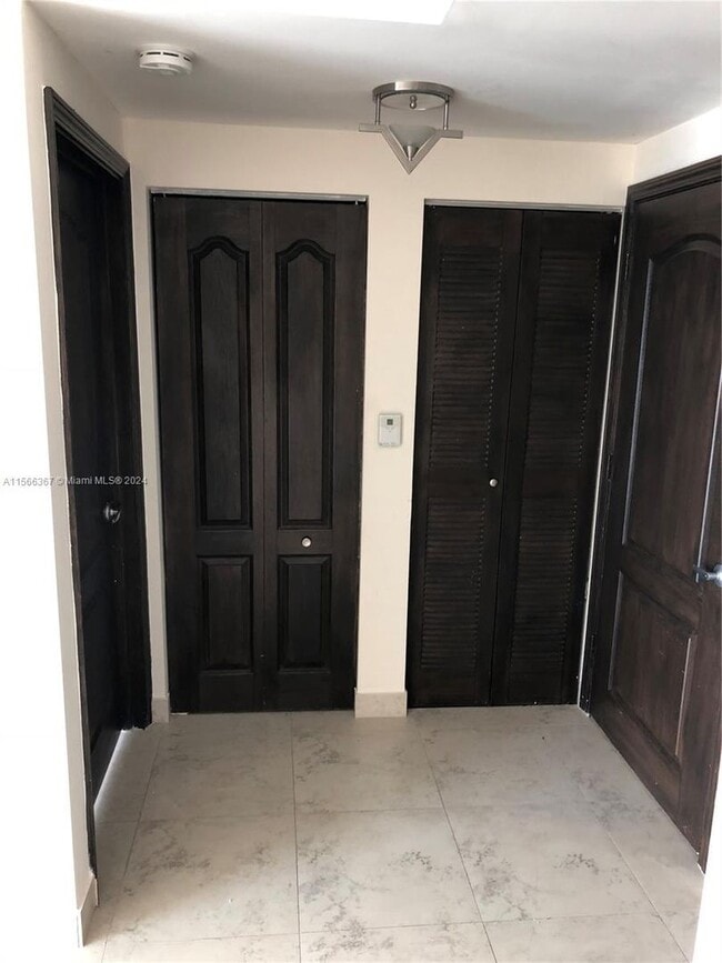 Building Photo - 117 NW 42nd Avenue 1603, Miami, FL 33126
