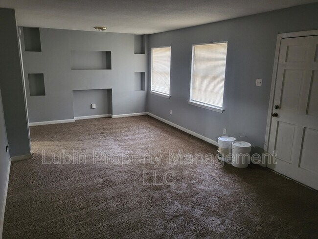 Building Photo - 4699 Spring Valley Dr