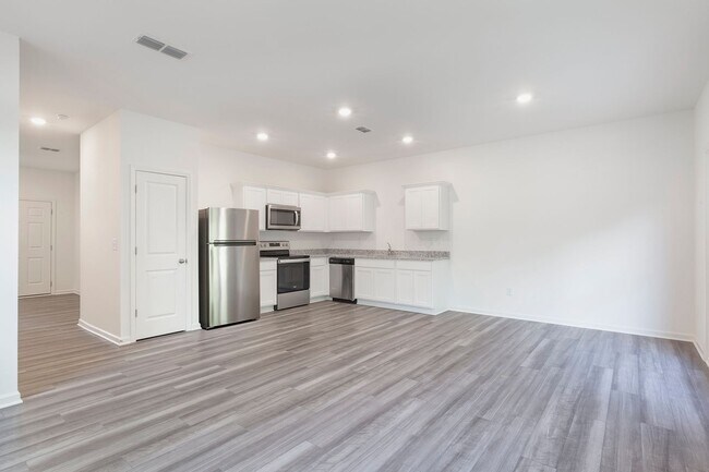 Building Photo - Newly Constructed 3/2.5 Townhome w/ Privat...